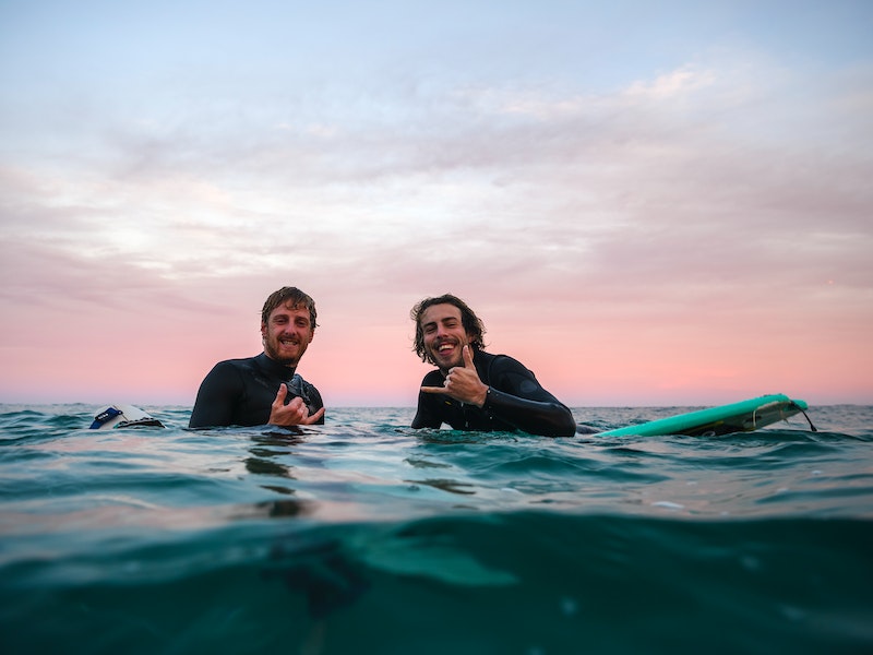 surfing students having fun